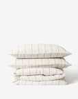Monday Linen Duvet- Chalk/Miso Stripe stacked pillows in breathable flax linen.